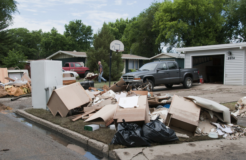 Debris from recent flooding in Minot, ND debris from his home in Minot,...