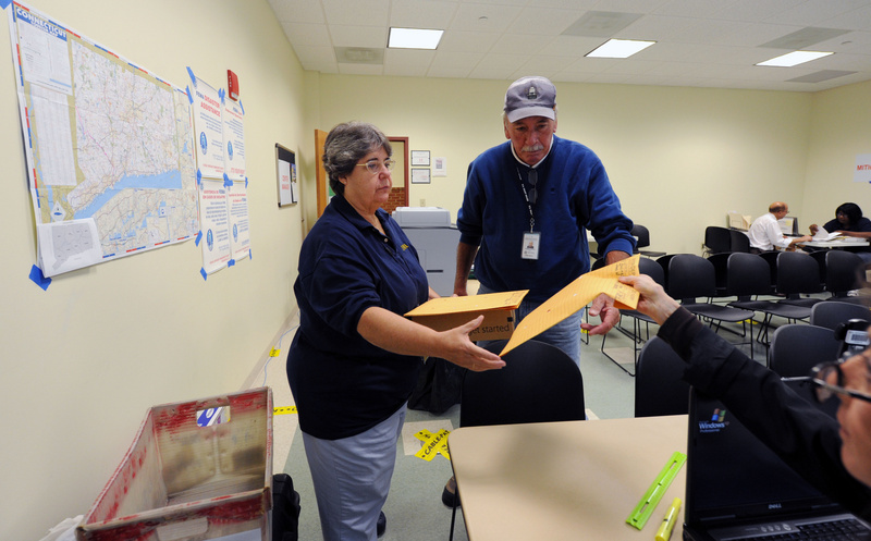Greenwich: FEMA Disaster Recovery Center manager, Ellen Hartleroad, gathers...