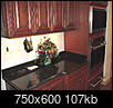 Kitchen Cabinet - White or Cherry?-black-20absolute-20counter.jpg