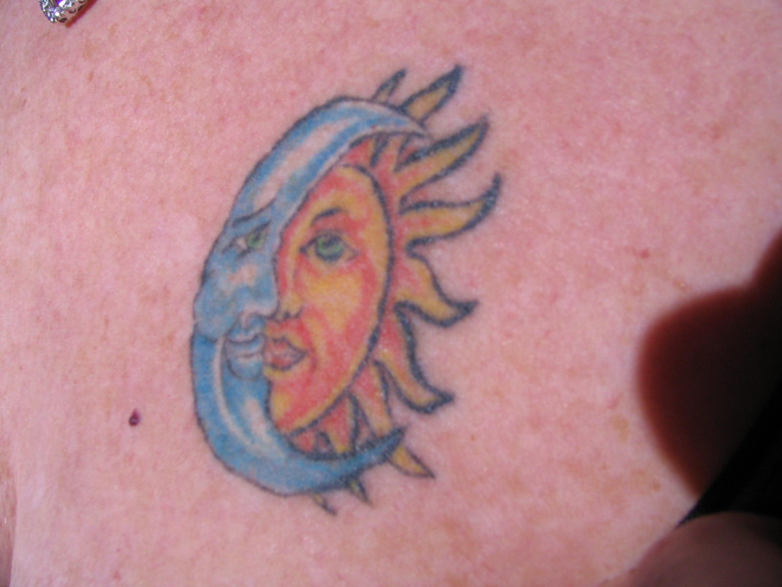tattoo of the sunmoon and
