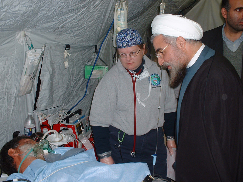 An Iranian government official visits patients at the U.S. field hospital....