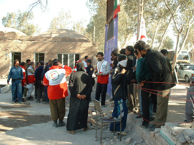 Iranian Red Crescent workers help earthquake victims. Photo by Marty Bahamonde/FEMA...
