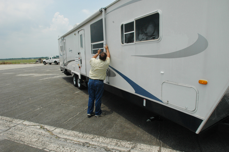 Pensacola: FEMA contractors move mobile trailers to safety in anticipation...