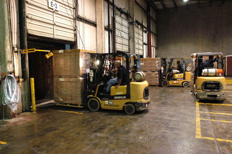 Trucks are loaded with Ready to Eat Meals (MREs) at the FEMA Palmetto...