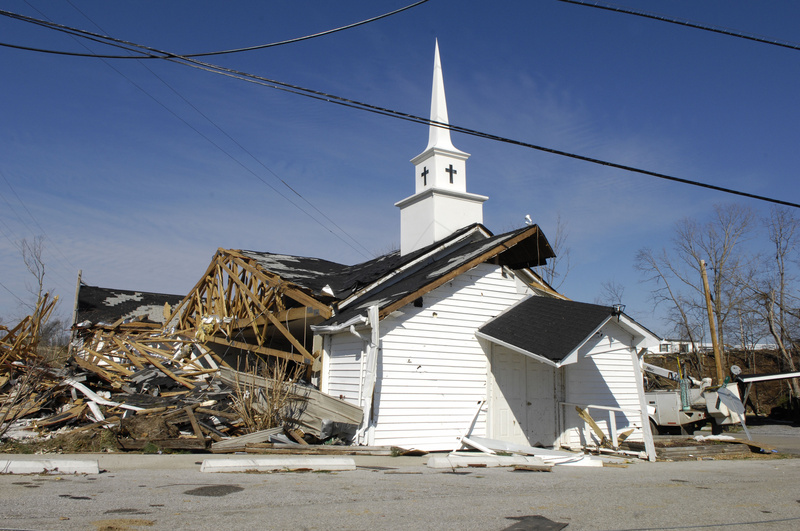 Lafayette: This church steeple stands tall amidst damaged buildings and...