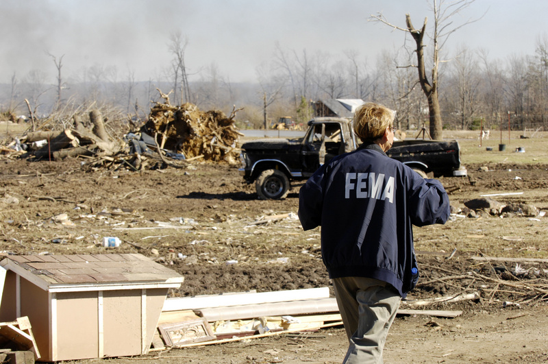 Atkins: FEMA Community Relations representatives visit residents to give...