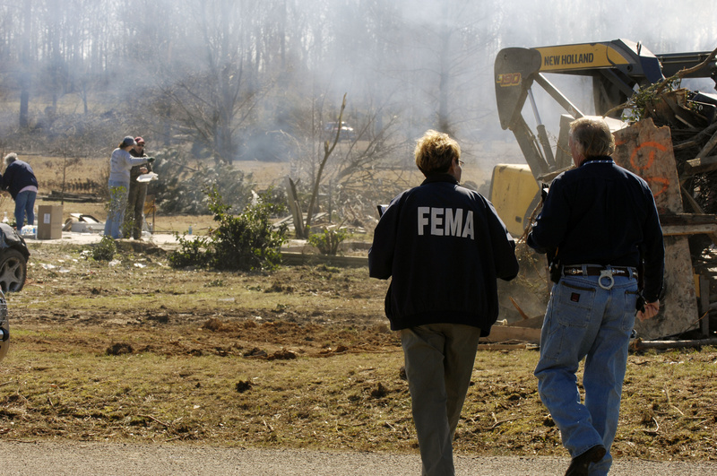 Atkins: A FEMA Community Relations representative speaks with an Arkansas...