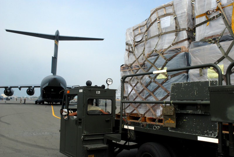 FEMA supplies from the Pacific Distribution Center are  loaded on a C-17...