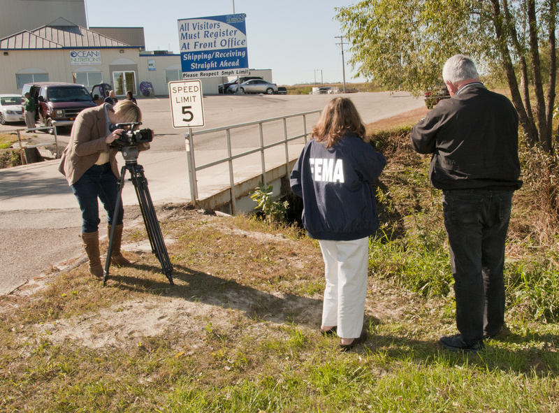 Arcadia: A FEMA Public Assistance team is filmed by a local TV station...