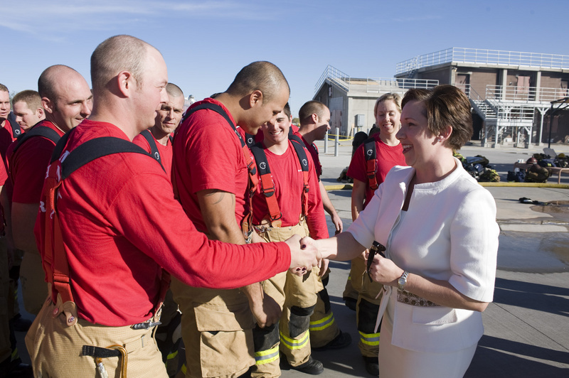 Elizabeth Harman greets members of Phoenix Fire Department recruit class...