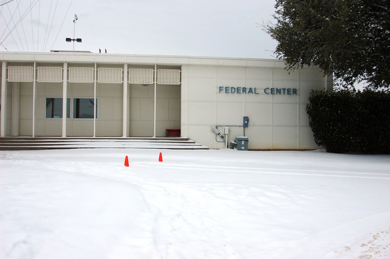 Ice and heavy snow cover the entrance to FEMA Region VI in Denton, Texas....