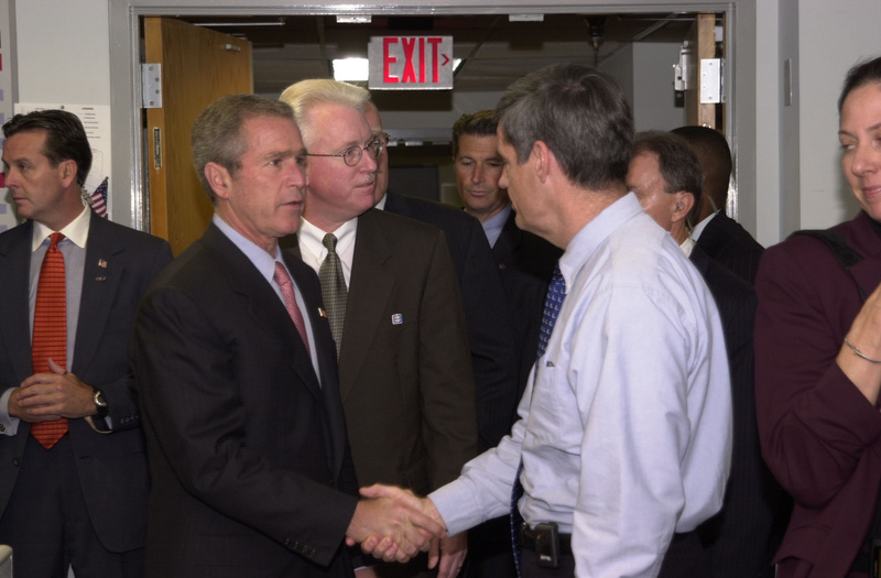 Washington: President Bush shakes hands with John Murray a member of the...