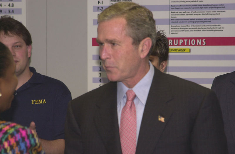 Washington: President Bush shakes hands with FEMA staff in the Emergency...