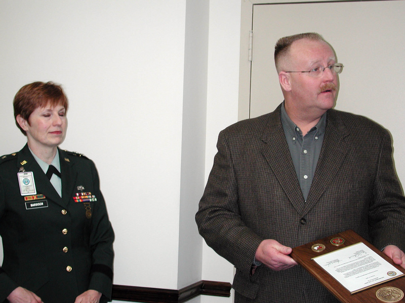 Washington: Major General Barbish presents a plaque to FEMA Director Allbaugh...