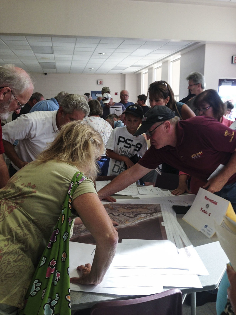 Marshfield: Residents pore over flood maps at a meeting with Federal,...