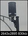 What are these black cylinder's on top of the lightpoles?-20210125_093856.jpg