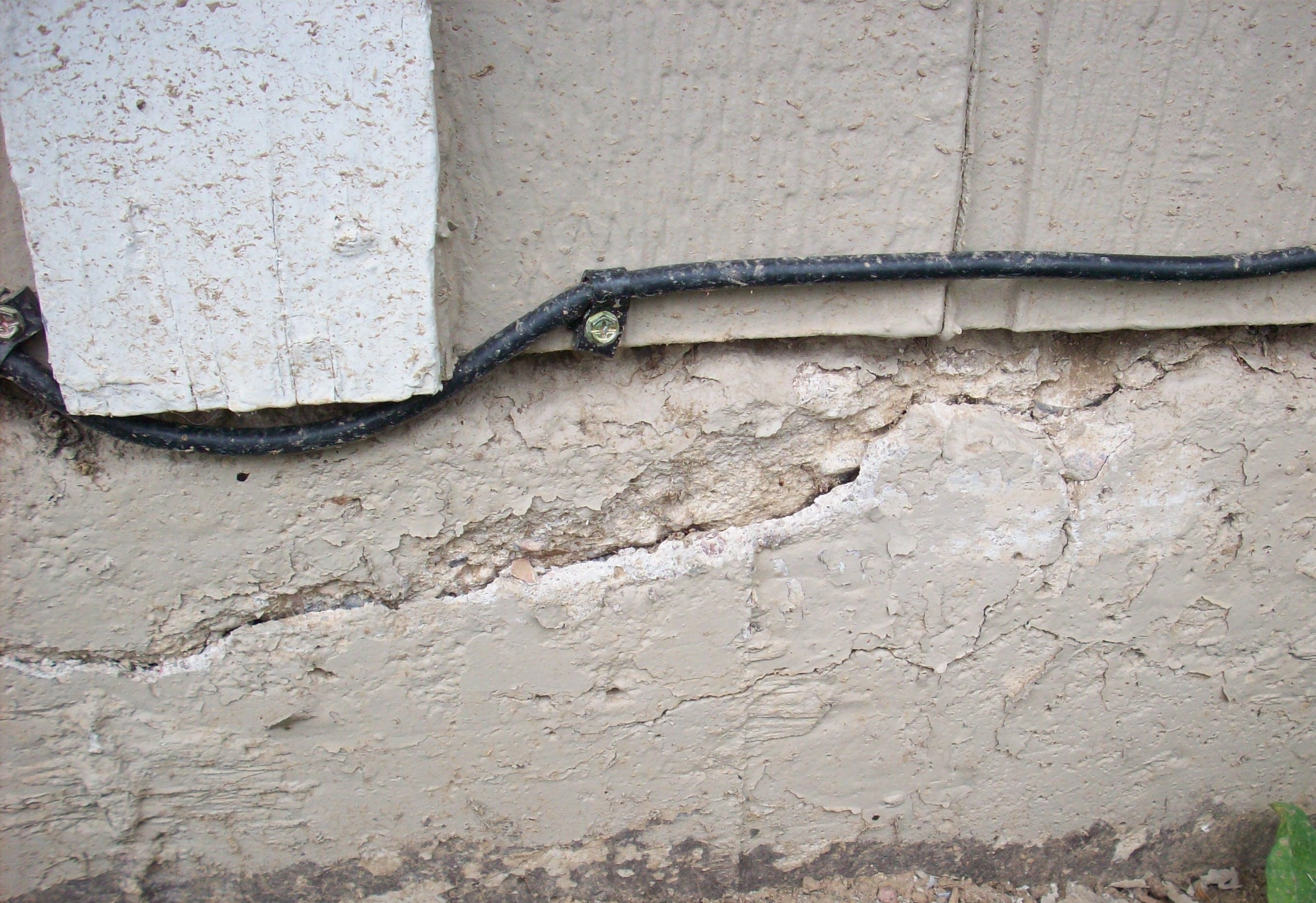 Need help for solving foundation crack and gap between siding and