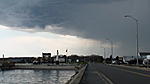 The frontal edge of an approaching thunderstorm makes for an ominous looking trek heading off the West Island Causeway this afternoon at 12:58PM....