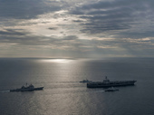 US ships take part in exercise with Malaysian ships.