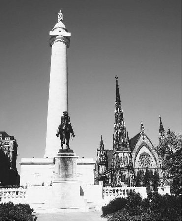 The Baltimore Washington Monument, designed by Robert Mills, was the first major memorial built in honor of George Washington.